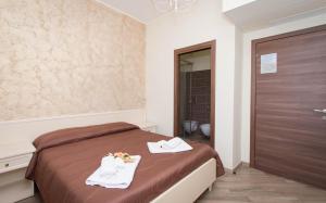 A bed or beds in a room at B&B Vista Santuario