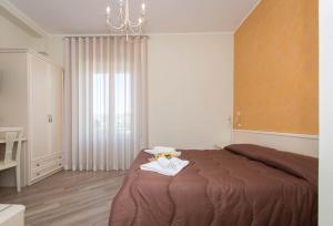 A bed or beds in a room at B&B Vista Santuario