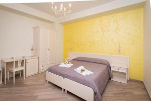 A bed or beds in a room at B&B Vista Santuario