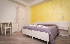 A bed or beds in a room at B&B Vista Santuario