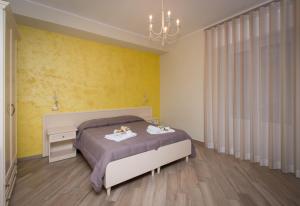 A bed or beds in a room at B&B Vista Santuario