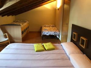 Cama o camas de una habitación en Casa Puigcerda