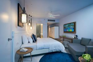 Letto o letti in una camera di Agamim by Isrotel Collection