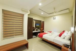 Cama o camas de una habitación en Sreepathi Indraprastha