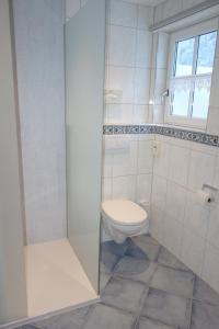 A bathroom at Ferienwohnung Brugger