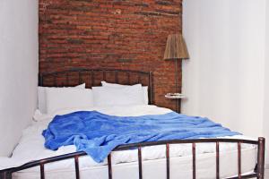 Postel nebo postele na pokoji v ubytování Maria's homestay