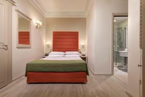Postel nebo postele na pokoji v ubytování BB Hotels Smarthotel Bailey's