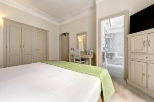 Postel nebo postele na pokoji v ubytování BB Hotels Smarthotel Bailey's