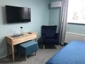 TV a/nebo společenská místnost v ubytování Dudman Hotel + 19 fotografií