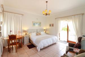Ένα ή περισσότερα κρεβάτια σε δωμάτιο στο A Tuscan Villa Guest House