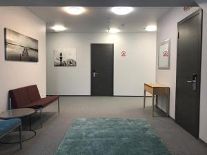 Posezení v ubytování Dudman Hotel