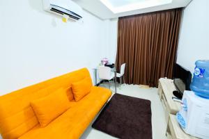 Istumisnurk majutusasutuses 1BR Sky Terrace Lagoon Condo Apartment near Daan Mogot Mall By Travelio