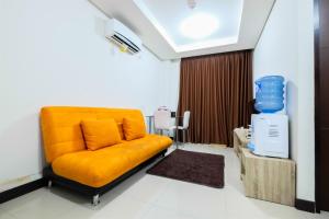 Istumisnurk majutusasutuses 1BR Sky Terrace Lagoon Condo Apartment near Daan Mogot Mall By Travelio