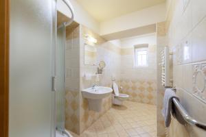 Vannituba majutusasutuses Hotel U Simla