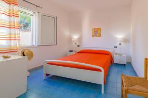 Postel nebo postele na pokoji v ubytování Lumia Case Vacanze
