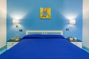 Postel nebo postele na pokoji v ubytování Lumia Case Vacanze