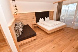 Postel nebo postele na pokoji v ubytování Hotel Kristall