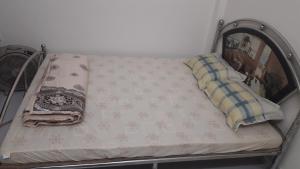 Postel nebo postele na pokoji v ubytování Homestay Nam Dong