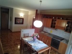 Kuchyň nebo kuchyňský kout v ubytování Apartament Casa Vacanze Niko ap cir CNI00247