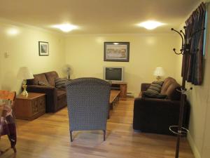 TV a/nebo společenská místnost v ubytování Comerford's Ocean View Suites