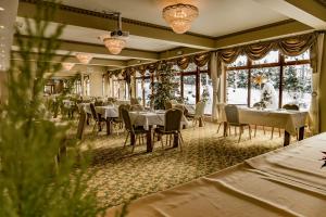 Łóżko lub łóżka w pokoju w obiekcie Eco Active Resort PIENINY