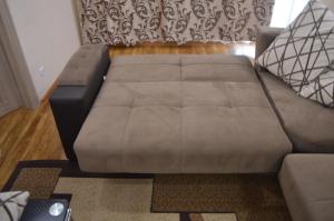 Posezení v ubytování TEO BEACH APARTAMENT + 30 fotografií