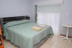 Palmas del Caribe tesisinde bir odada yatak veya yataklar