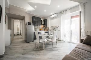 A kitchen or kitchenette at La Fiaba Roma Apartment