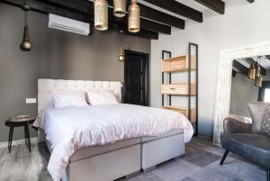A bed or beds in a room at Casa La Vuelta