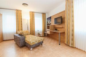 TV a/nebo společenská místnost v ubytování Hotel & Restaurant Pötter