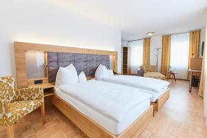 Postel nebo postele na pokoji v ubytování Hotel & Restaurant Pötter + 21 fotografií