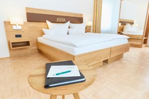 Postel nebo postele na pokoji v ubytování Hotel & Restaurant Pötter