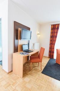 TV a/nebo společenská místnost v ubytování Hotel & Restaurant Pötter