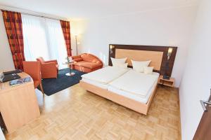 Postel nebo postele na pokoji v ubytování Hotel & Restaurant Pötter