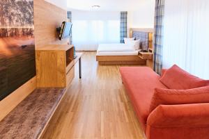 TV a/nebo společenská místnost v ubytování Hotel & Restaurant Pötter