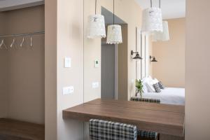 Cama ou camas em um quarto em Casa das Muralhas