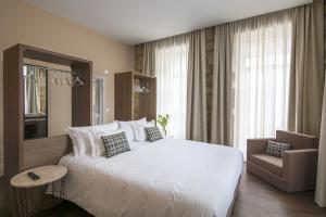 Cama ou camas em um quarto em Casa das Muralhas