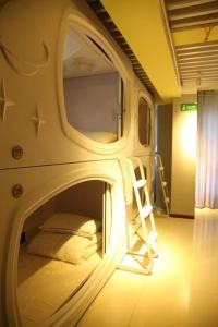 Imagine din galeria proprietății Wuhan Worry-free Capsule Hotel în Wuhan
