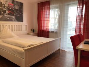 Cama o camas de una habitación en Hotel Alka