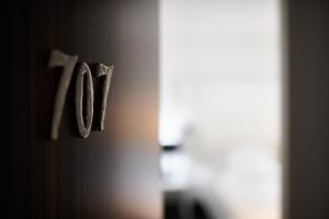 a close up of a door knob on a wall at Hôtel Le Windsor Biarritz in Biarritz