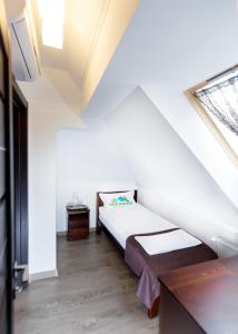 Posteľ alebo postele v izbe v ubytovaní GORHouse Hotel