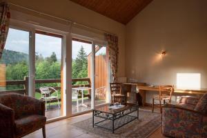 Posezení v ubytování Logis Hôtel Restaurant Neuhauser