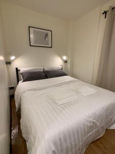 Postel nebo postele na pokoji v ubytování House 116