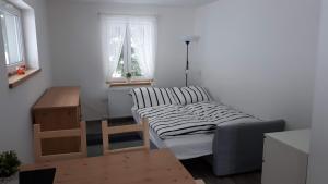 Postel nebo postele na pokoji v ubytování Apartmán Liška v Peci - apartmánový dům Horalka, Pec pod Sněžkou