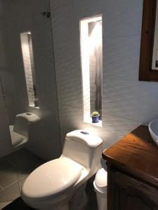 Koupelna v ubytování 40 Amigos Hotel