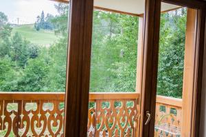 Balkón alebo terasa v ubytovaní Apartament Pod Modrzewiami