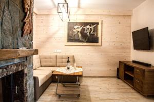 Posedenie v ubytovaní Apartament Pod Modrzewiami