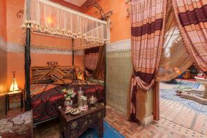 Postel nebo postele na pokoji v ubytování Riad bleu du Sud + 37 fotografií