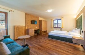 Postel nebo postele na pokoji v ubytování Hotel Waldheim