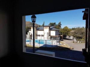 
Una vista de la pileta en Duplex Posta de la Villa o alrededores
